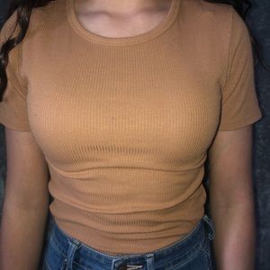 tan body suit